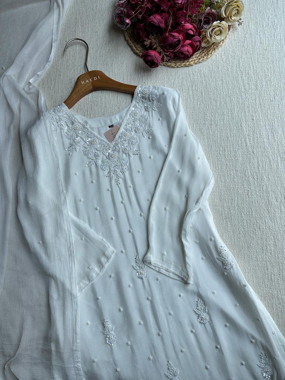 19855 Beautiful handworked partywear suit