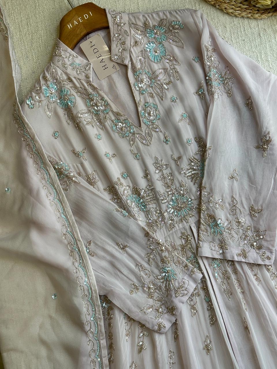 18489 Premium handworked suit with skirt