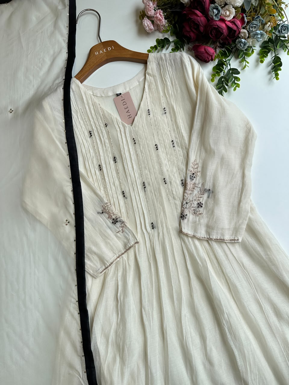 20894 Premium malai chanderi suit with handwork detailing