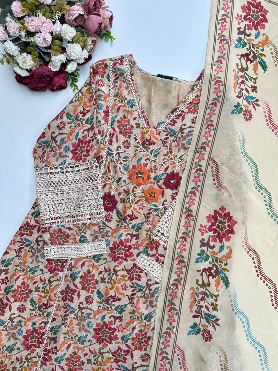 21373 Beautiful embroidered suit with Lace details