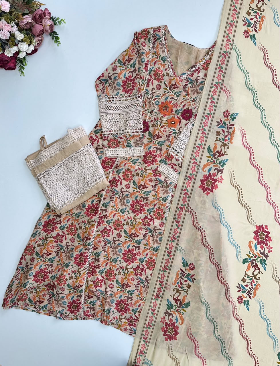 21373 Beautiful embroidered suit with Lace details