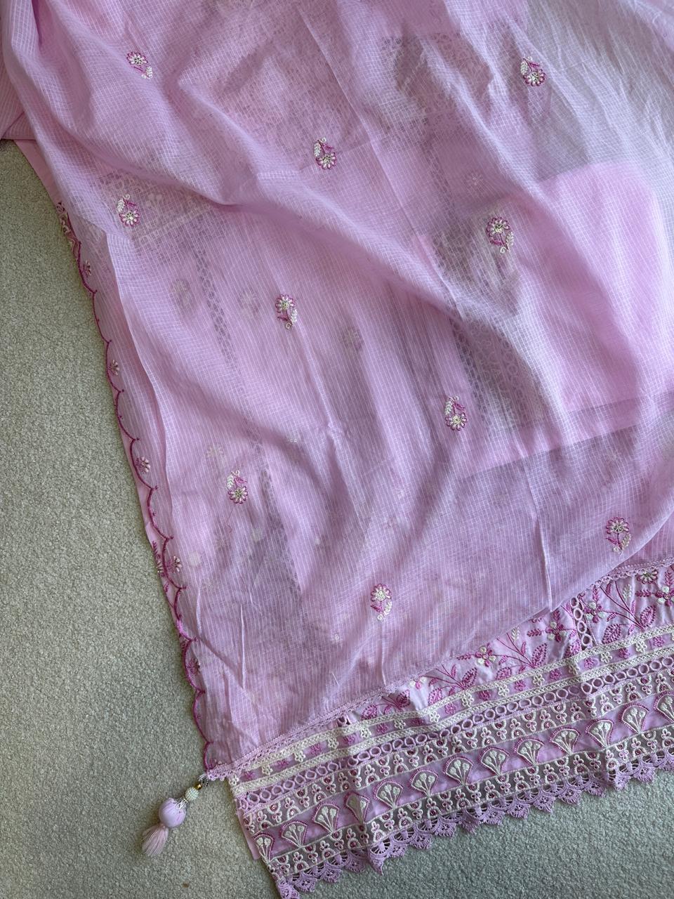 19257 Beautiful embroidered suit with lace detailing
