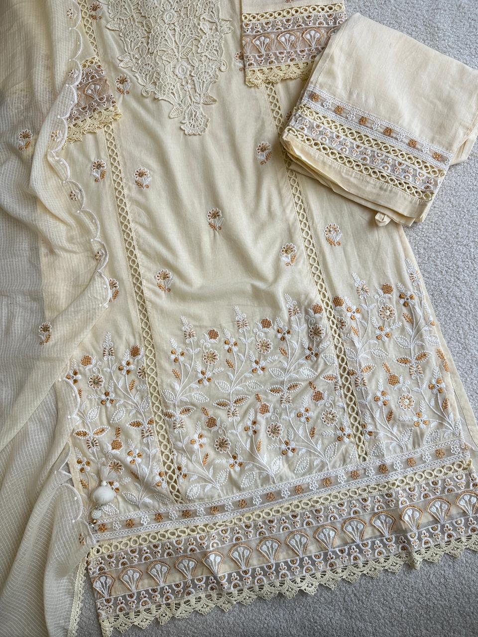 19257 Beautiful embroidered suit with lace detailing