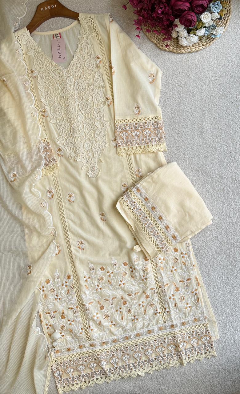 19257 Beautiful embroidered suit with lace detailing